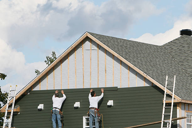 Professional Siding Installation technician working in Olivia, MN